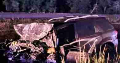A crumpled and destroyed SUV in the ditch after terrible car accident