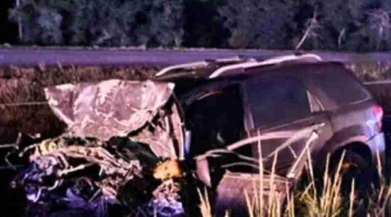 A crumpled and destroyed SUV in the ditch after terrible car accident