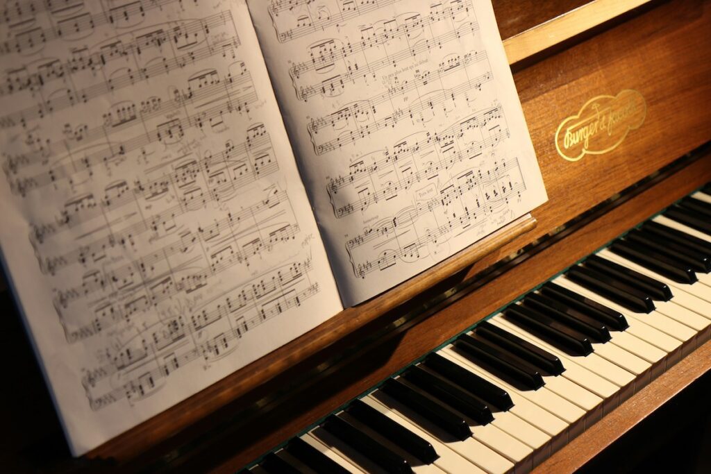 A piano and sheet music.
