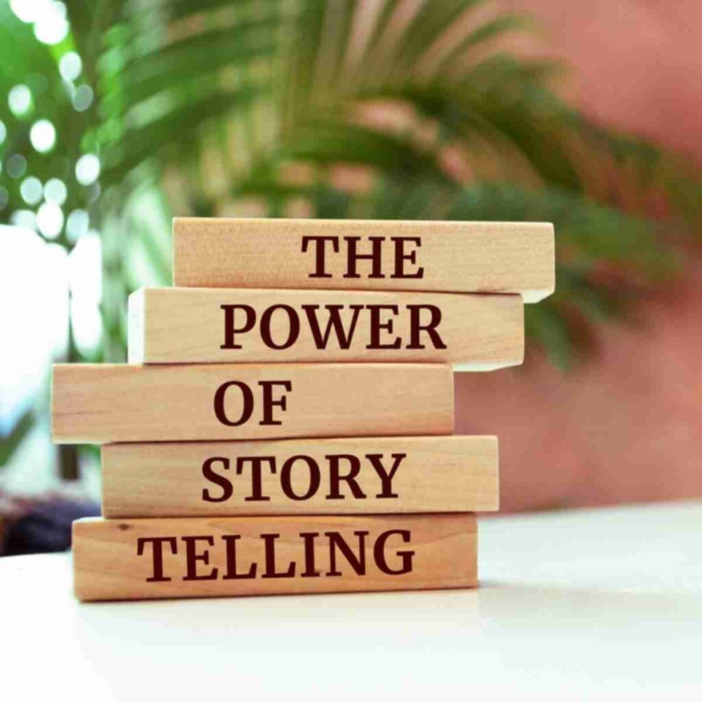 A stack of wooden blocks, with each block containing a word, spelling out the phrase "the power of story telling"
