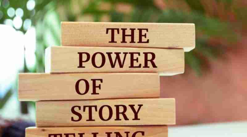 A stack of wooden blocks, with each block containing a word, spelling out the phrase "the power of story telling"