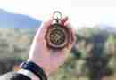 Photo of a hand holding up a compass. Image by Pexels from Pixabay