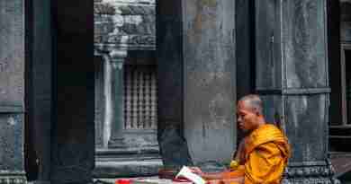 Image of buddhist monk practicing mantra meditation outside temple by theminjukim from Pixabay