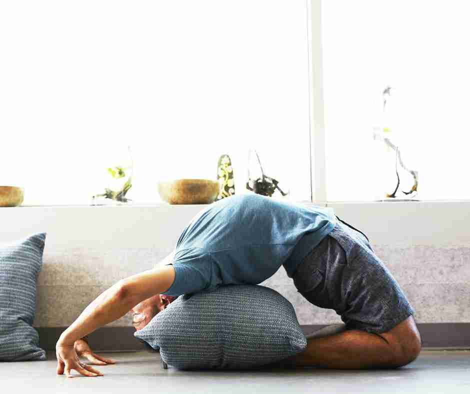 Untitled design (46) - Resilient Stories Man practicing yoga with pillow