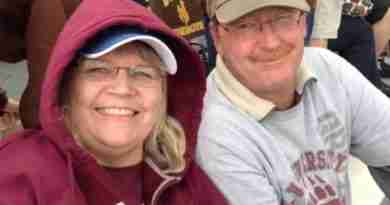 Photo of Barb and Mike at a Montana Griz game