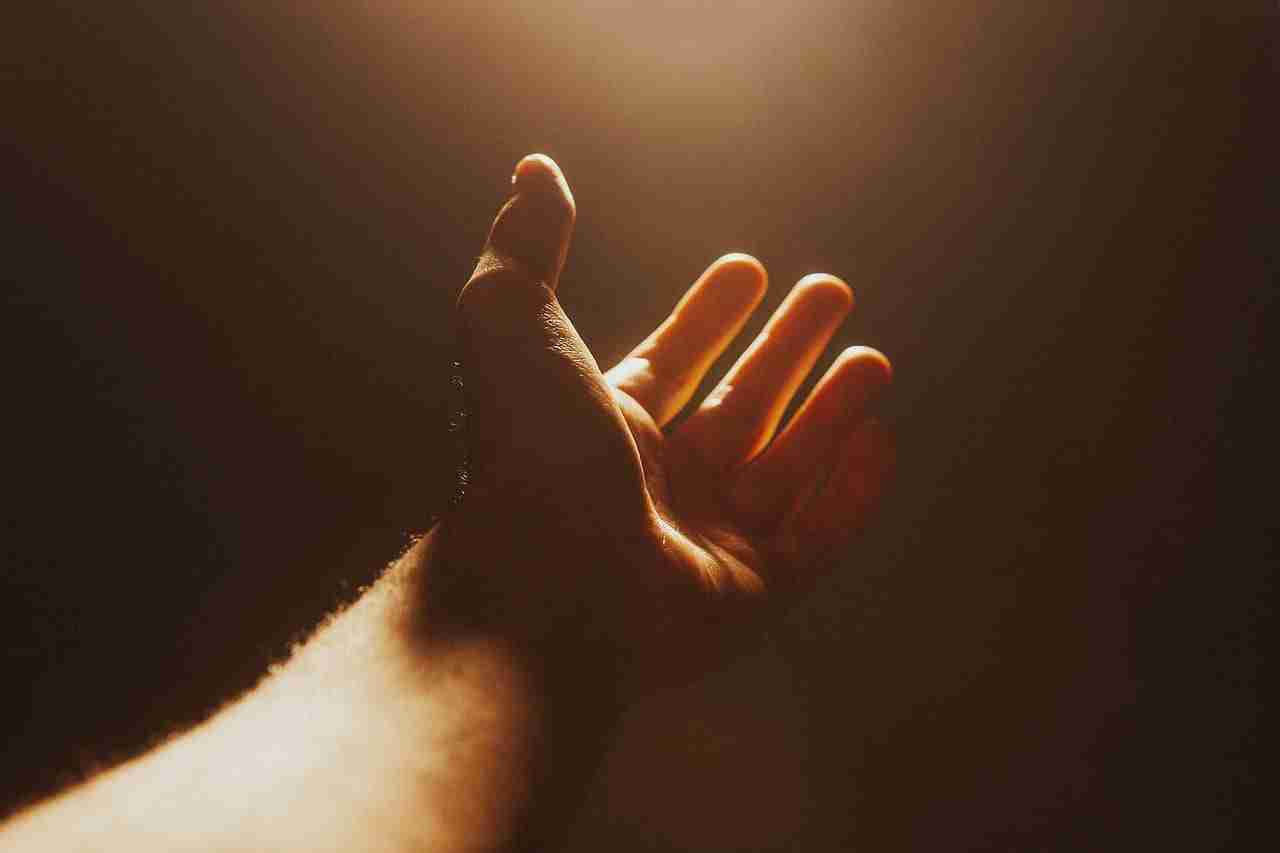 hand-4661763_1280 - Resilient Stories Image by 1857643 from Pixabay. Hand reaching out toward a light.