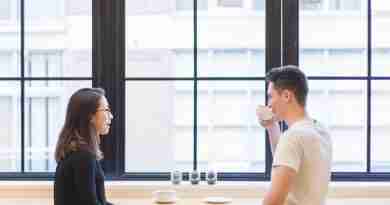 Asian man and woman sitting in from of large window enjoying a conversation over tea/coffee. Image by StockSnap from Pixabay