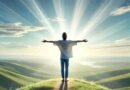 AI image of a person set against a clear, bright daytime sky with soft clouds. The individual stands on a hilltop with arms outstretched, eyes closed, and a peaceful smile, surrounded by light beams and rolling green hills and calm blue horizon in the background.