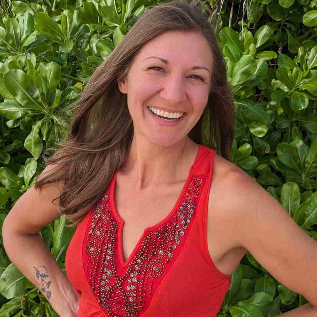 Photo of Krista Lindquist: intuitive guide, yoga life coach, all-natural crafter, and best-selling author on a mission to help others in their healing journey.