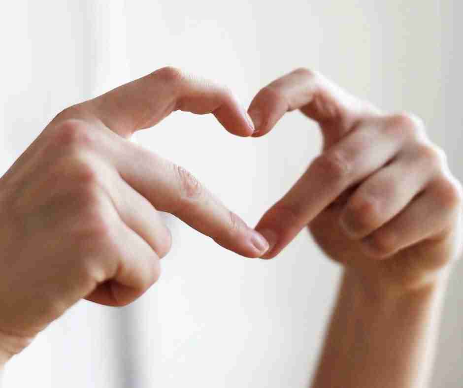 Two hands forming a heart shape