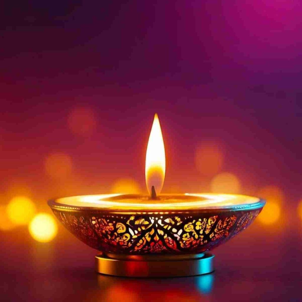 Image by Satheesh Sankaran from Pixabay. Lighted diya glows during Diwali celebrations.