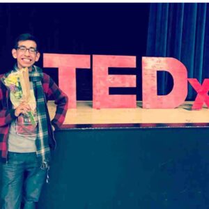 A photo of the author, Alan Cruz, participating in a TEDx Talk for youths about what it is like living with Marfan's Syndrome.