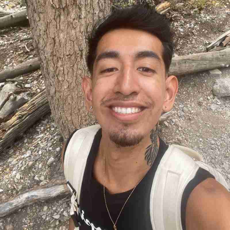 A photo of Alan out hiking on a trail. This is something he enjoys and manages to do even while having Marfan's Syndrome.