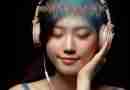 AI-generated image of Asian girl listening to headphones with eyes closed and colorful glowing representation of sound waves going through her head