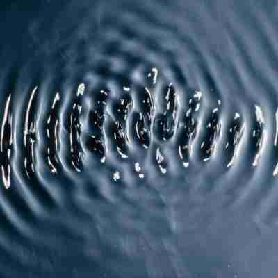 photo of water rippling in a sound wave pattern