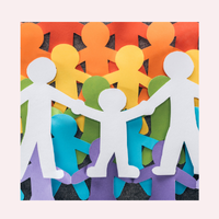 A group of cut out little paper figures in all the colors of the rainbow representing what it is like being LGBTQ+.