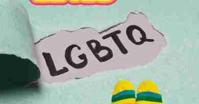 A green background with the words "Be You" and "LGBTQ" on it. There are a pair of feet wearing rainbow socks in the corner.