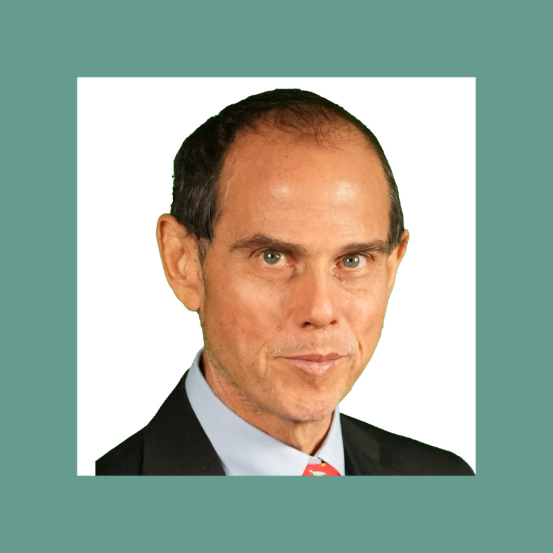 A headshot of Stanley Bronstein.