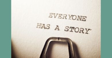 The words "Everyone has a story" appear on typeset font on a piece of paper still in the typewriter.