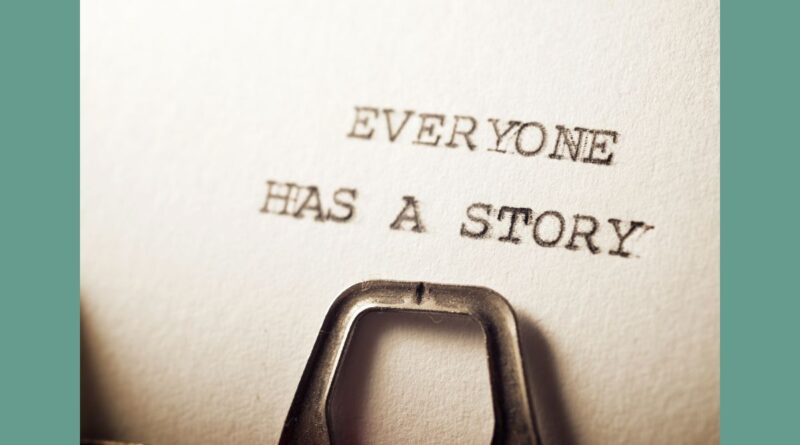 The words "Everyone has a story" appear on typeset font on a piece of paper still in the typewriter.