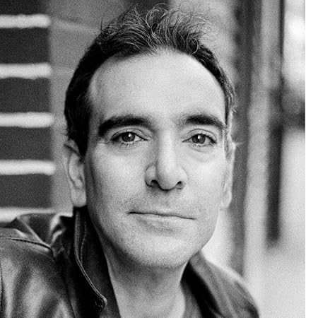 A headshot of the author, Aaron Poochigian, provided by the author.