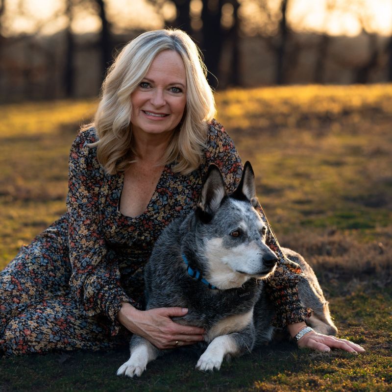 A photo of Theo Boyd and her dog.